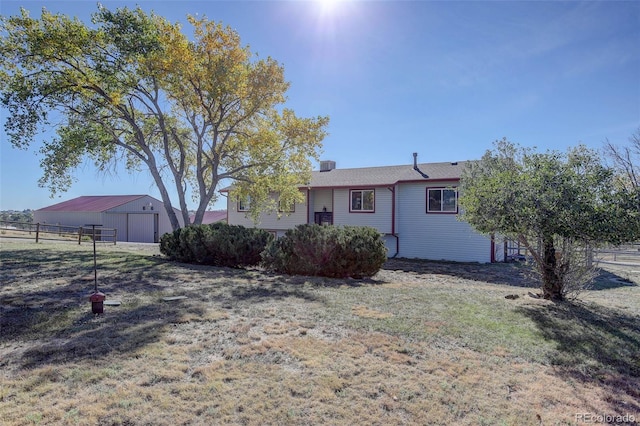 view of front facade with a front yard