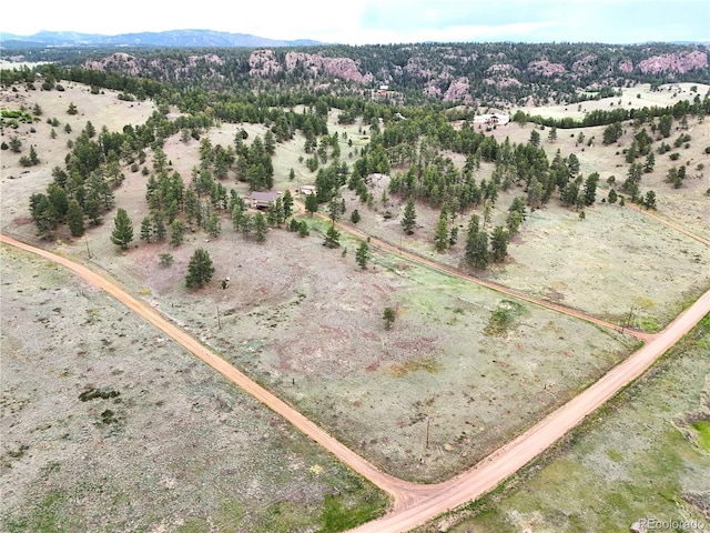 aerial view featuring a mountain view and a rural view