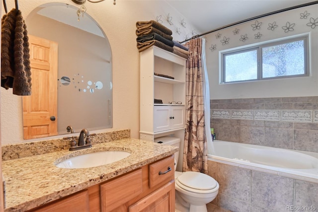 full bathroom featuring vanity, toilet, and shower / bathtub combination with curtain