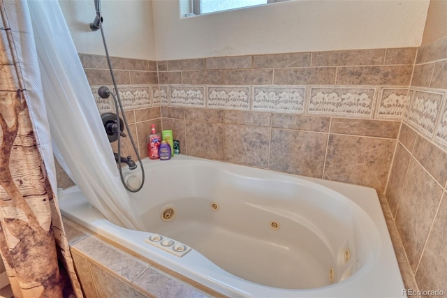 bathroom featuring tiled bath