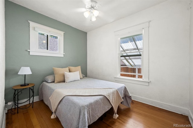 5008 Sherman St, Denver, CO 80216 - bedroom featuring wood-type flooring and ceiling fan
