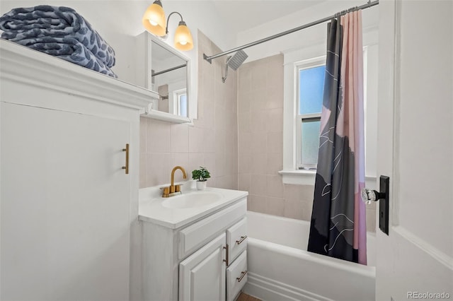 5008 Sherman St, Denver, CO 80216 - full bathroom featuring shower / bath combo, vanity, and tile walls