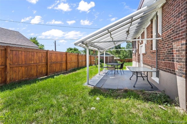 5008 Sherman St, Denver, CO 80216 - fenced backyard featuring a patio