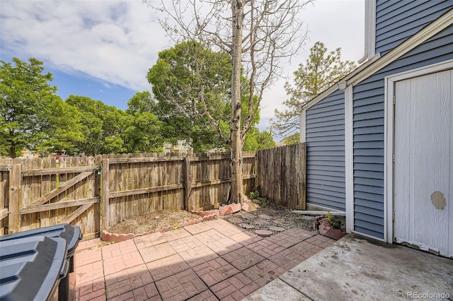 4130 E 94th Ave Unit B, Thornton, CO 80229 - fenced backyard featuring a patio and a gate