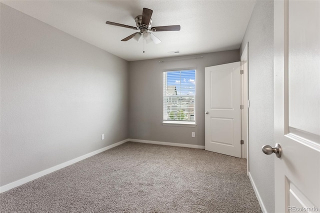 2248 Rosette Ln, Castle Rock, CO 80104 - spare room featuring light colored carpet and a ceiling fan