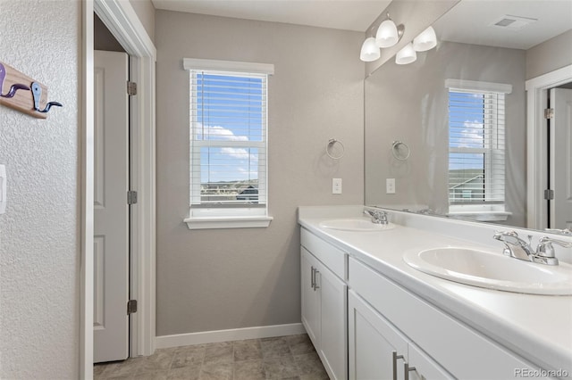 2248 Rosette Ln, Castle Rock, CO 80104 - bathroom with double vanity and plenty of natural light