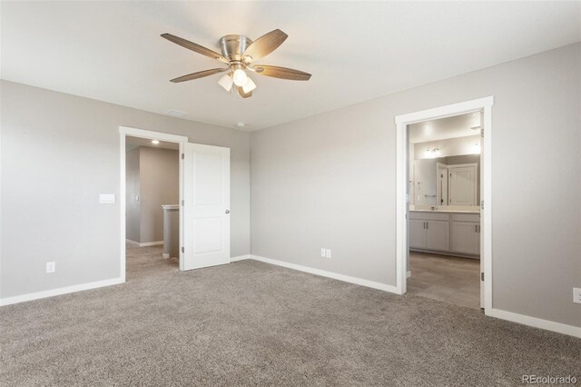 2248 Rosette Ln, Castle Rock, CO 80104 - unfurnished bedroom with carpet, connected bathroom, and a ceiling fan