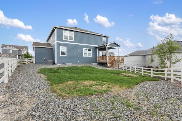 2248 Rosette Ln, Castle Rock, CO 80104 - back of property with a fenced backyard, a deck, and stairs
