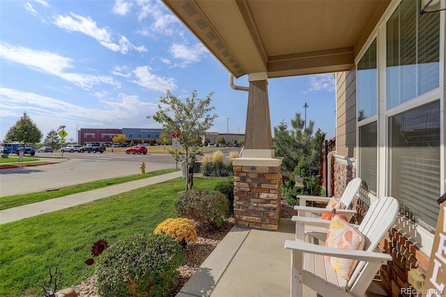 view of patio featuring a porch