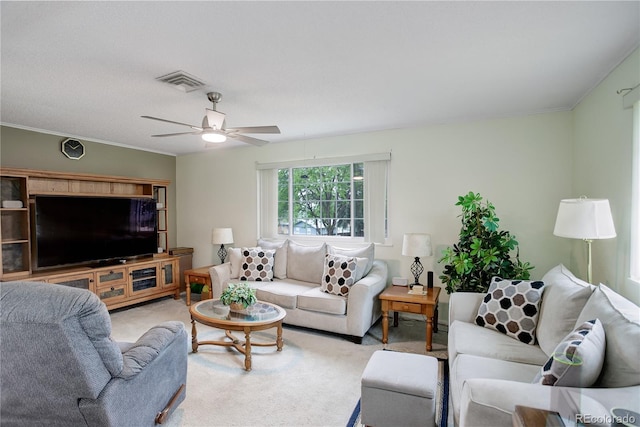 9642 Meade Ct, Westminster, CO 80031 - carpeted living room featuring a ceiling fan and crown molding