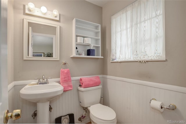 9642 Meade Ct, Westminster, CO 80031 - bathroom featuring wainscoting and toilet