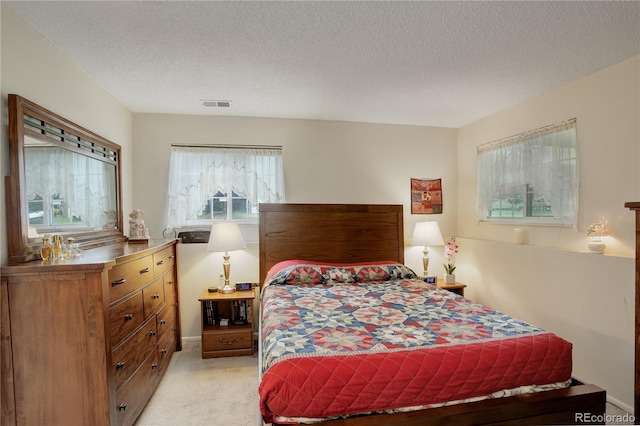 9642 Meade Ct, Westminster, CO 80031 - bedroom with light carpet and a textured ceiling