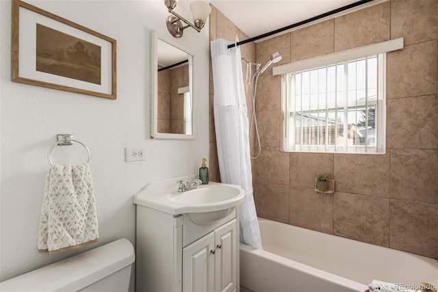 full bathroom with vanity, shower / bathtub combination with curtain, and toilet