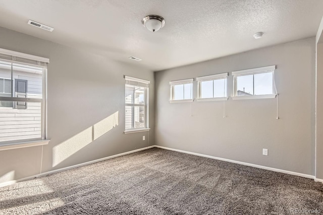4406 Sidewinder Loop, Castle Rock, CO 80108 - empty room featuring carpet, baseboards, a smoke detector, and a textured ceiling