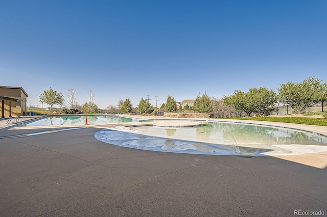 4406 Sidewinder Loop, Castle Rock, CO 80108 - community pool featuring a patio area
