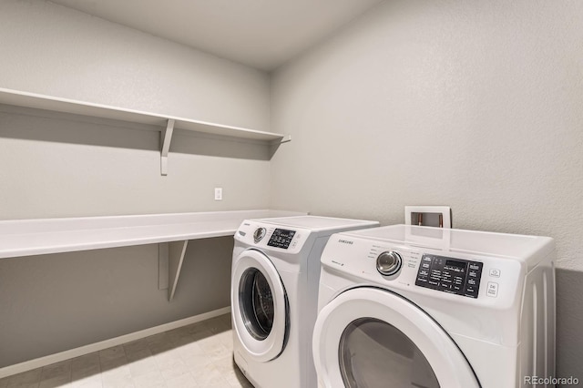 4406 Sidewinder Loop, Castle Rock, CO 80108 - washroom with washing machine and dryer and baseboards