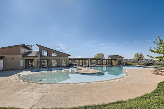 4406 Sidewinder Loop, Castle Rock, CO 80108 - community pool featuring a patio
