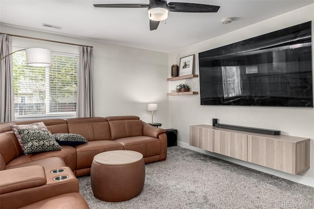 12908 Hudson St, Thornton, CO 80241 - living area with light colored carpet and a ceiling fan