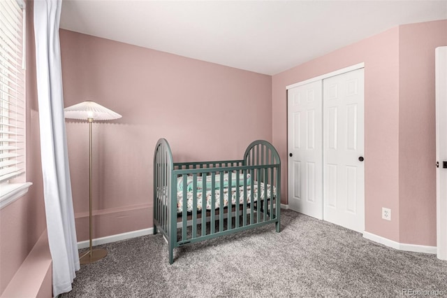 12908 Hudson St, Thornton, CO 80241 - carpeted bedroom featuring a closet and a nursery area