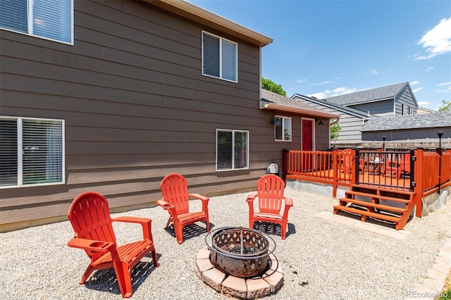 12908 Hudson St, Thornton, CO 80241 - view of patio / terrace featuring an outdoor fire pit and a deck