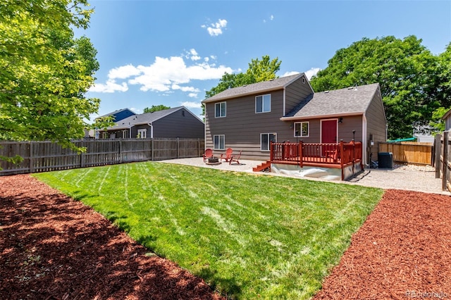 12908 Hudson St, Thornton, CO 80241 - back of house with a patio, a fenced backyard, a deck, and a shingled roof