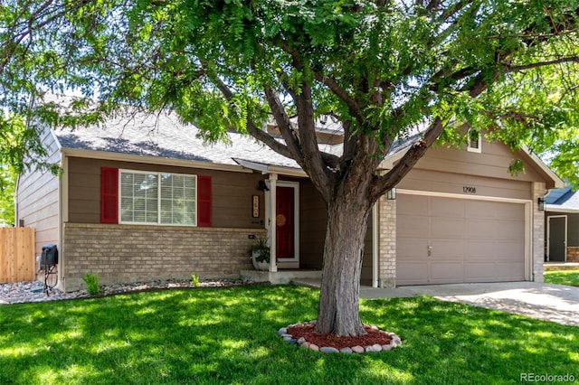 12908 Hudson St, Thornton, CO 80241 - view of front of property with brick siding, concrete driveway, and an attached garage