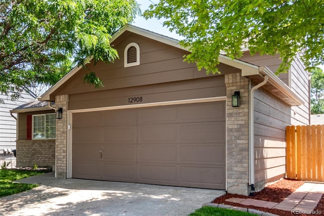 12908 Hudson St, Thornton, CO 80241 - garage featuring driveway