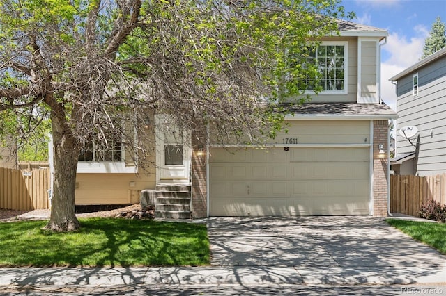 17611 Hoyt Pl, Parker, CO 80134 - view of front of home with fence, brick siding, driveway, and a garage