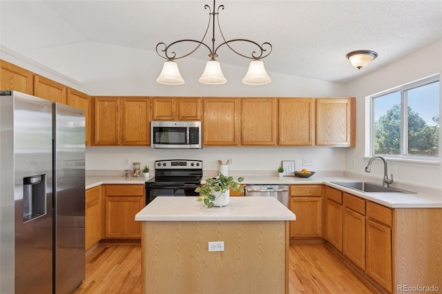 17611 Hoyt Pl, Parker, CO 80134 - kitchen with stainless steel appliances, a sink, light wood-style floors, and light countertops