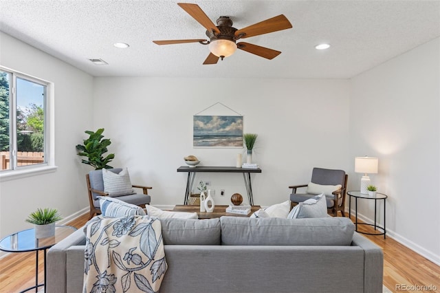 17611 Hoyt Pl, Parker, CO 80134 - living area featuring recessed lighting, light wood-type flooring, ceiling fan, and baseboards