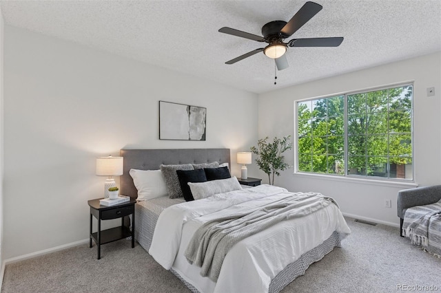 17611 Hoyt Pl, Parker, CO 80134 - bedroom with carpet floors, baseboards, a textured ceiling, and a ceiling fan