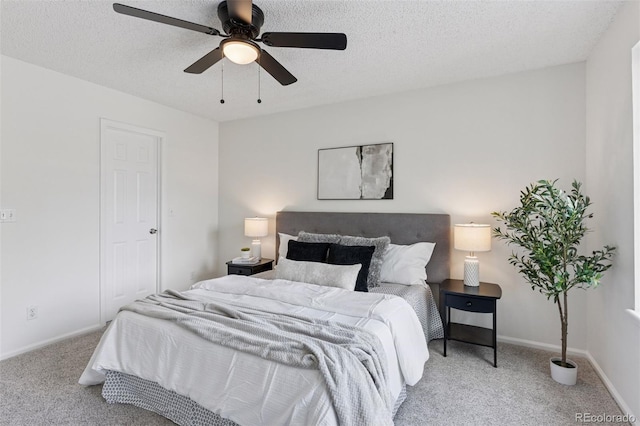 17611 Hoyt Pl, Parker, CO 80134 - bedroom with carpet flooring, a ceiling fan, baseboards, and a textured ceiling