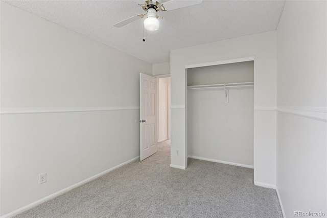 17611 Hoyt Pl, Parker, CO 80134 - unfurnished bedroom featuring carpet flooring, a closet, baseboards, ceiling fan, and a textured ceiling