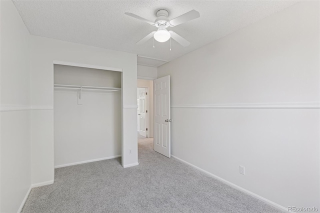 17611 Hoyt Pl, Parker, CO 80134 - unfurnished bedroom with carpet floors, a closet, a textured ceiling, baseboards, and a ceiling fan