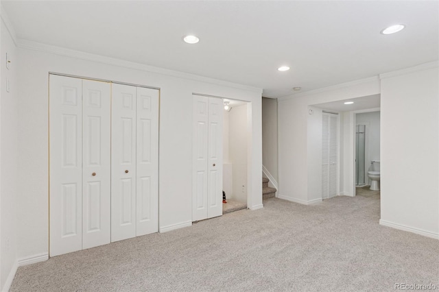 17611 Hoyt Pl, Parker, CO 80134 - unfurnished bedroom featuring ornamental molding, multiple closets, carpet floors, recessed lighting, and baseboards
