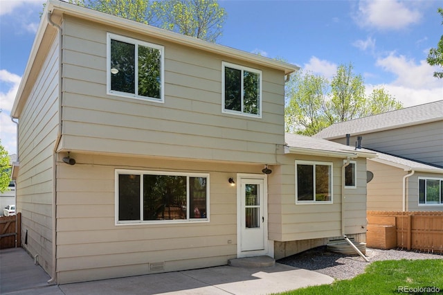 17611 Hoyt Pl, Parker, CO 80134 - rear view of house featuring fence, crawl space, and a patio