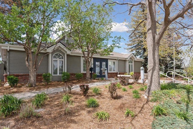 17611 Hoyt Pl, Parker, CO 80134 - single story home featuring french doors and brick siding