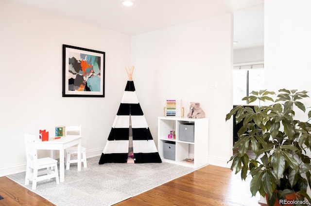 3004 S Niagara Way, Denver, CO 80224 - rec room featuring wood finished floors and recessed lighting