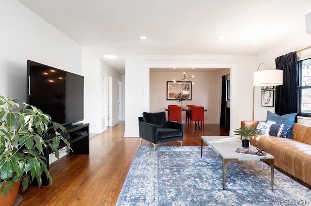 3004 S Niagara Way, Denver, CO 80224 - living room with wood finished floors, a chandelier, and recessed lighting