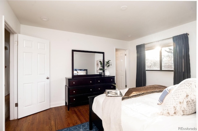 3004 S Niagara Way, Denver, CO 80224 - bedroom featuring wood finished floors