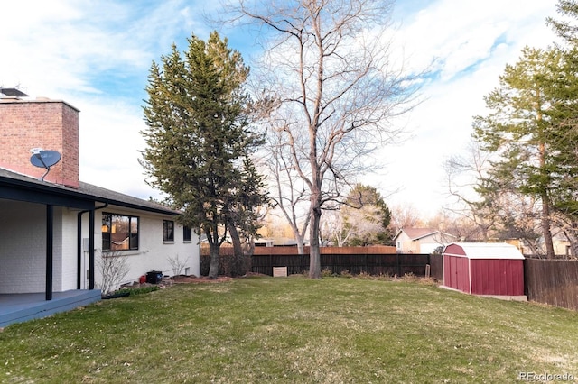 3004 S Niagara Way, Denver, CO 80224 - fenced backyard featuring a storage shed