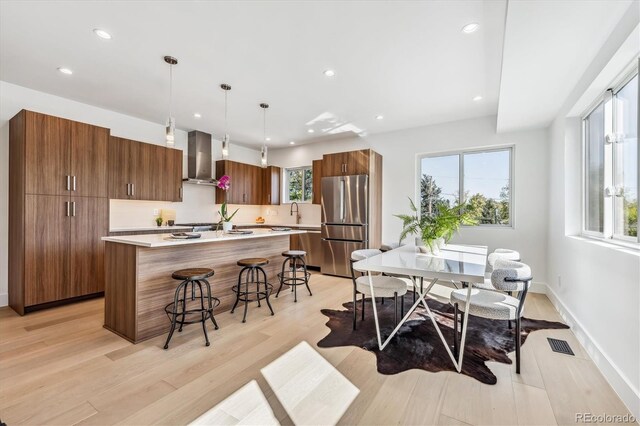 dining room featuring light wood-type flooring