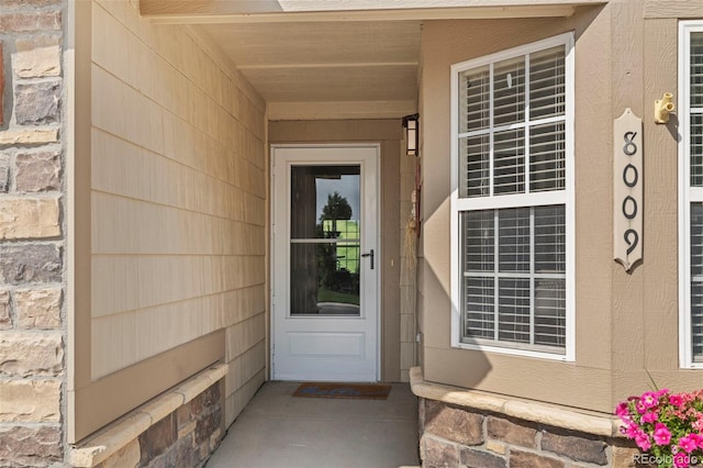 8009 S Algonquian Ct, Aurora, CO 80016 - entrance to property featuring a porch