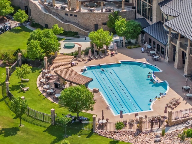 8009 S Algonquian Ct, Aurora, CO 80016 - community pool featuring a patio area