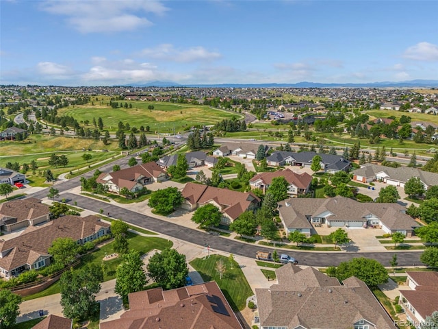 8009 S Algonquian Ct, Aurora, CO 80016 - aerial view of residential area featuring a mountain backdrop
