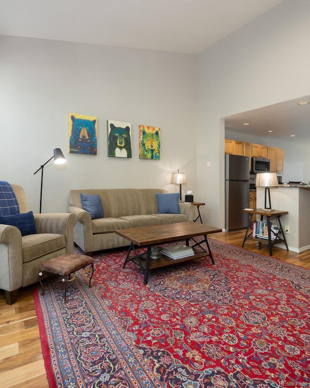 77 Spyglass Ln Unit 77, Silverthorne, CO 80498 - living area featuring light wood-style floors and recessed lighting