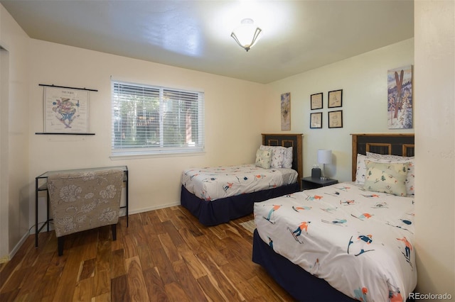 77 Spyglass Ln Unit 77, Silverthorne, CO 80498 - bedroom with wood finished floors and baseboards