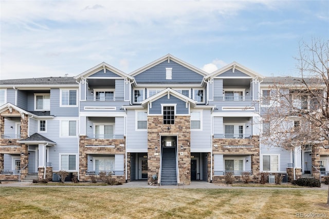 view of property with a front lawn