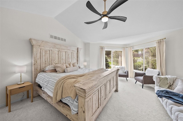 10802 W Indore Dr, Littleton, CO 80127 - bedroom with lofted ceiling, light carpet, and a ceiling fan