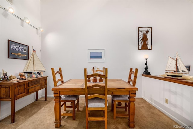 9400 E Iliff Ave Unit 88, Denver, CO 80231 - dining space with light carpet and baseboards